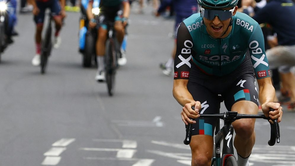 Jai Hindley (r.) ist auf dem Weg zum Sieg beim Giro - Bildquelle: AFP/SID/LUCA BETTINI