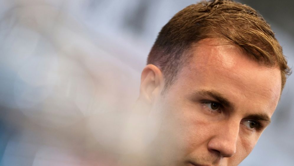Mario Götze auf der Pressekonferenz des DFB-Teams - Bildquelle: AFP/SID/DANIEL ROLAND