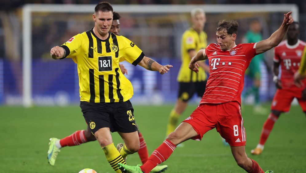 Bayern München und Borussia Dortmund kämpfen um den Titel in der Bundesliga - Bildquelle: 2022 Getty Images