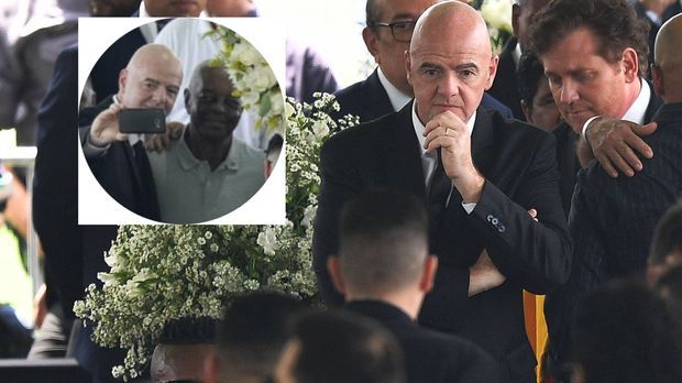 Gianni Infantino defends the selfies on the coffin at the funeral service